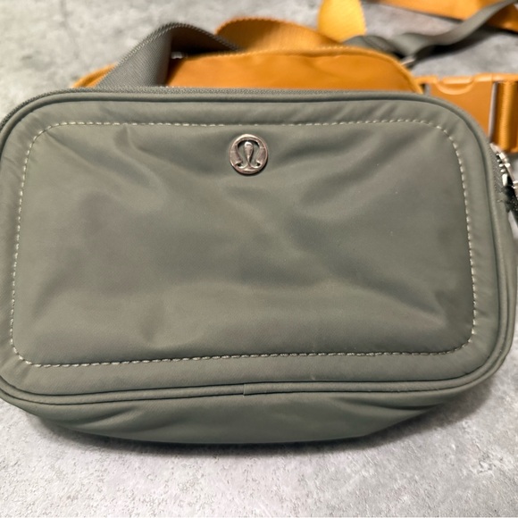 lululemon athletica Handbags - 2 bags included! lululemon athletica Olive purse and camel Belt Bag